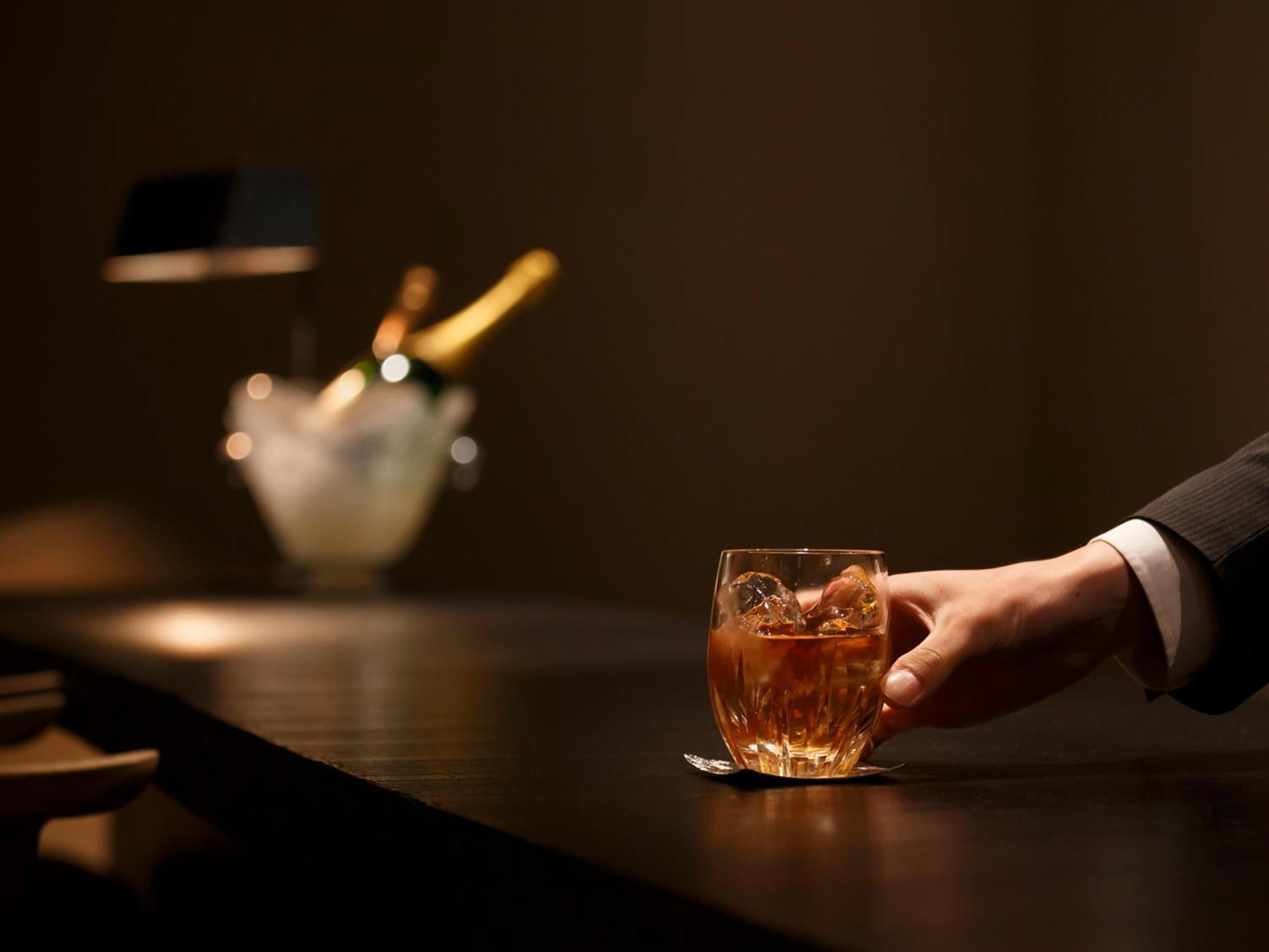 Hotel The Celestine Kyoto Gion Екстер'єр фото A bartender serving a drink